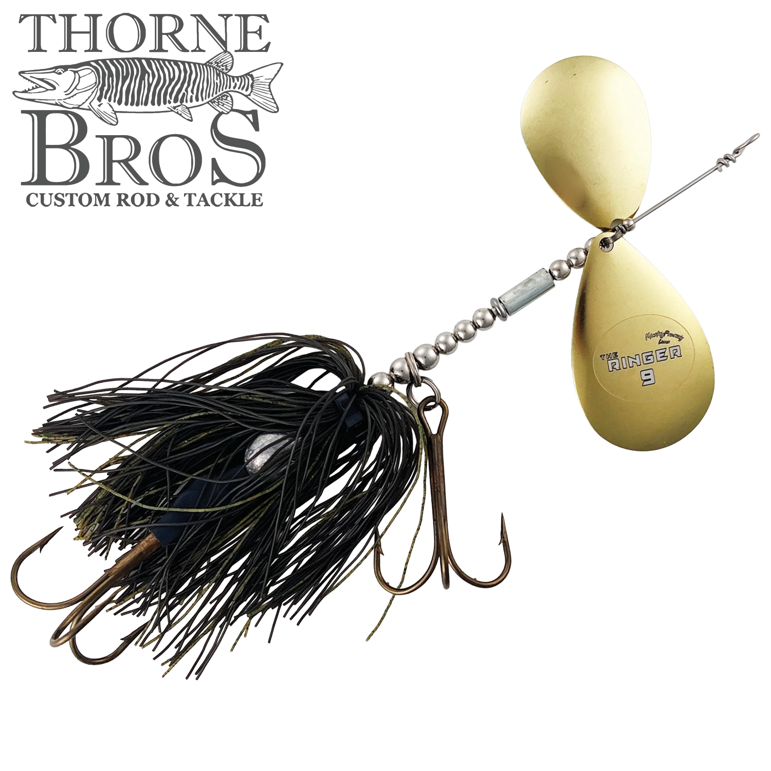 Close-up of Musky Frenzy The Ringer 9 fishing lure featuring a black and green skirt, two large gold spinner blades, and treble hooks designed for musky fishing.
