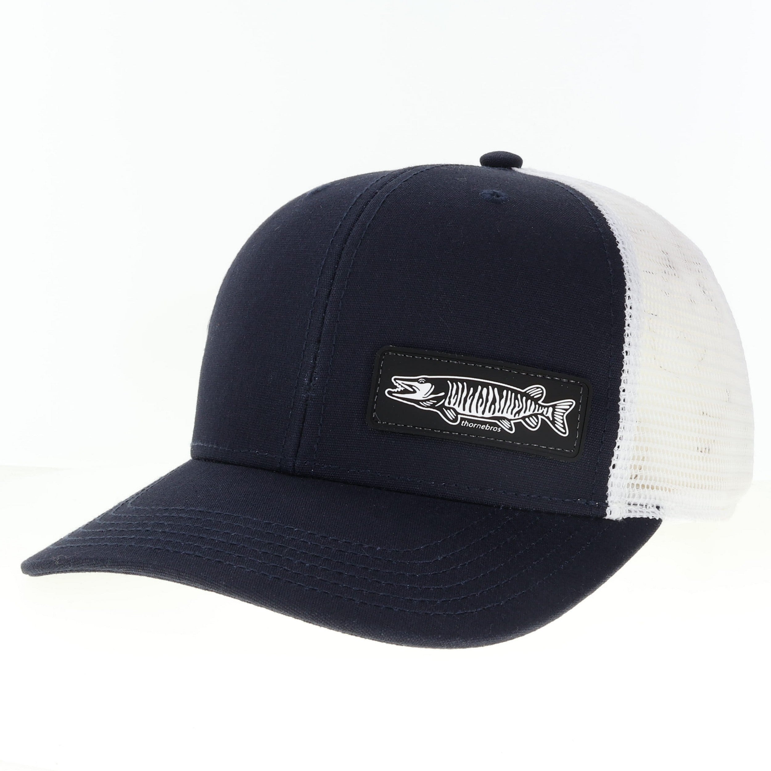 Thorne Bros. Legacy Mid-Pro Small Rubber Musky hat featuring a navy blue front panel and white mesh back with a detailed musky fish patch on the front.