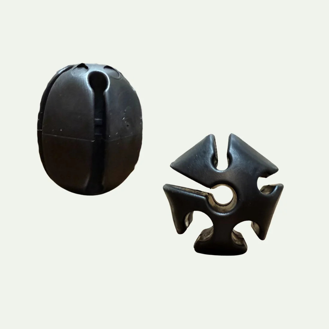 Trxstle Flex-Lock Silicone Rod Keeper shown as a black flexible fishing rod holder with a round cover and secure locking base