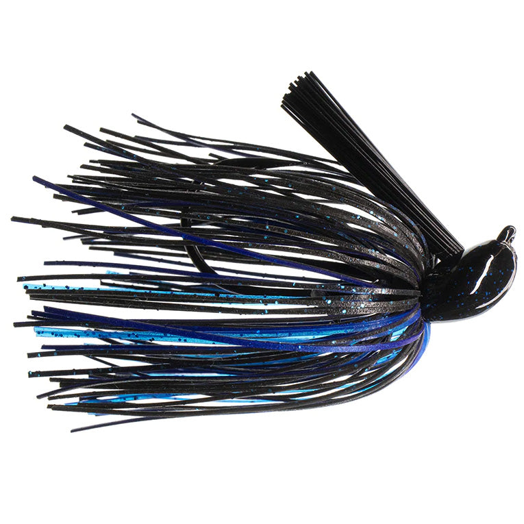 Dirty Jigs Tour Level Pitchin' Jig in black and blue with a weighted head and flexible skirt, designed for effective fishing tackle use.