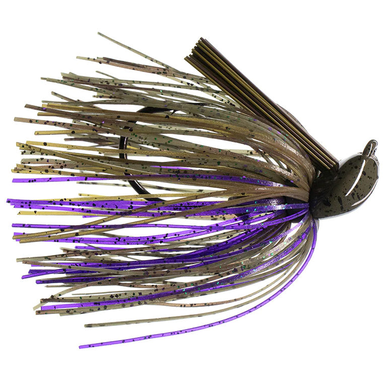 Dirty Jigs Tour Level Pitchin' Jig in brown and purple hues with a weighted head, flexible skirt strands, and weed guard, designed for effective fishing tackle use.