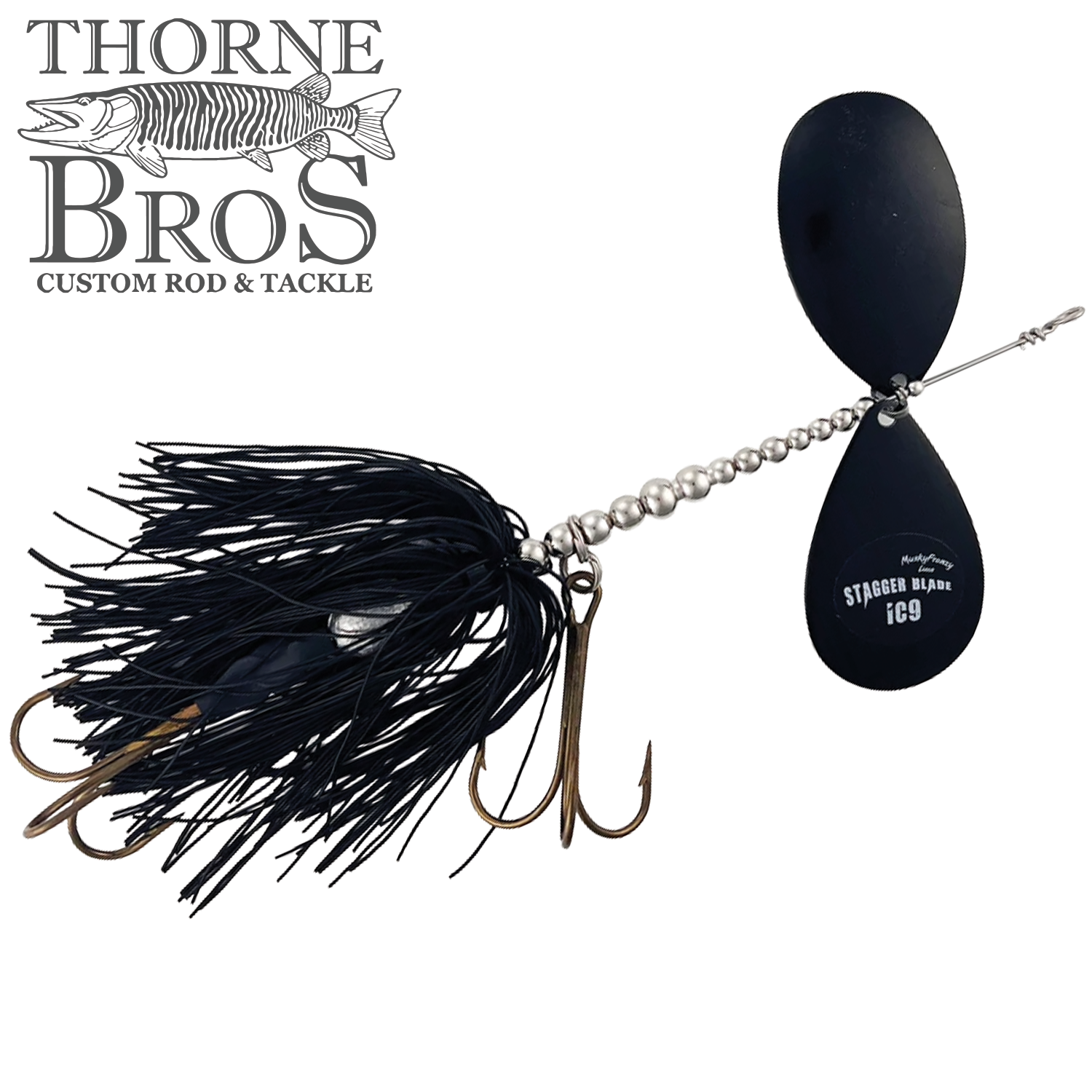 Musky Frenzy Apache Stag IC9 fishing lure with black skirt, silver beaded wire, and dual black staggered blades designed for musky fishing.