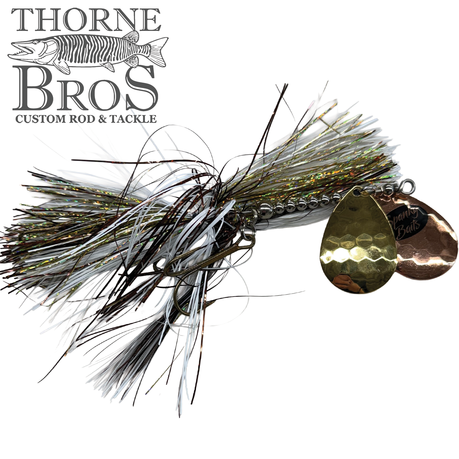 Spanky Baits Fireball 8" fishing lure featuring a multi-colored skirt with reflective strands and two hammered metal spinner blades in gold and copper tones.