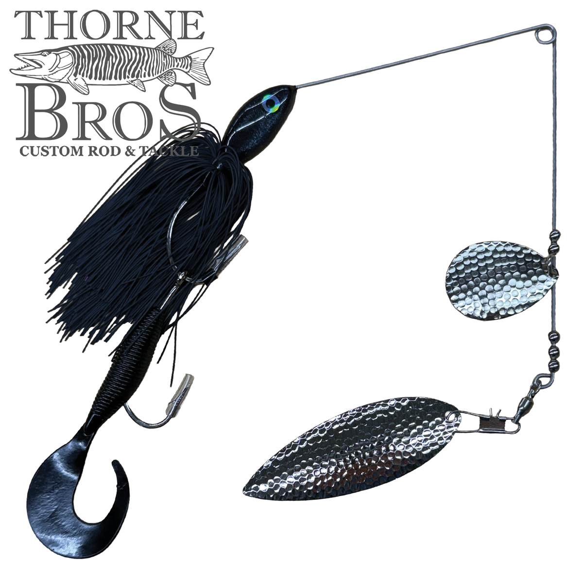 Ace Baits Monster Spinnerbait black musky fishing lure with a skirted hook and two hammered silver blades shown on a white background