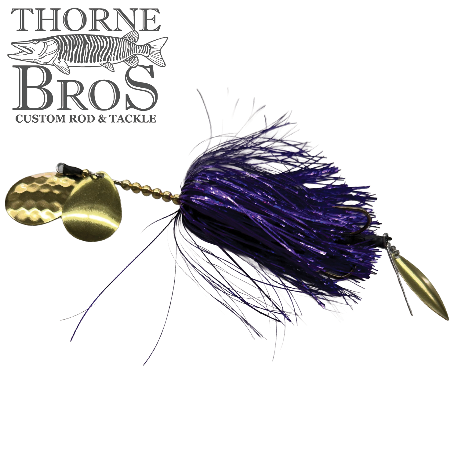 Hunsy Tails 7/8 Banger fishing lure with purple and black skirt, featuring two shiny gold spinner blades and a gold-colored hook, designed for musky fishing tackle.