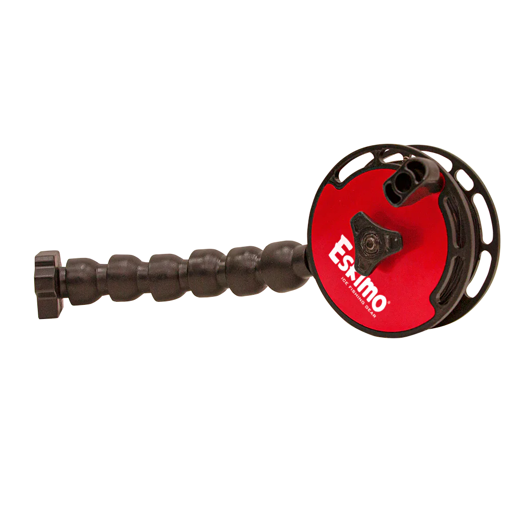 Eskimo E-Hub Rattle Reel with a red circular spool, black ergonomic handle, and durable construction designed for efficient ice fishing and musky tackle use.
