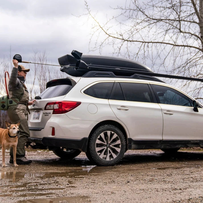 Trxstle CRC Flr Rod Carrier V3.0 mounted on a vehicle roof with fishing rods secured for convenient outdoor fishing tackle transport
