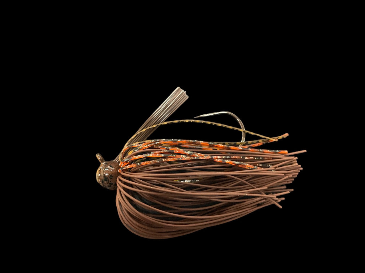Greenfish Tackle Crawball Living Rubber Football Jig fishing lure with brown and orange skirt, designed for musky and ice fishing tackle.