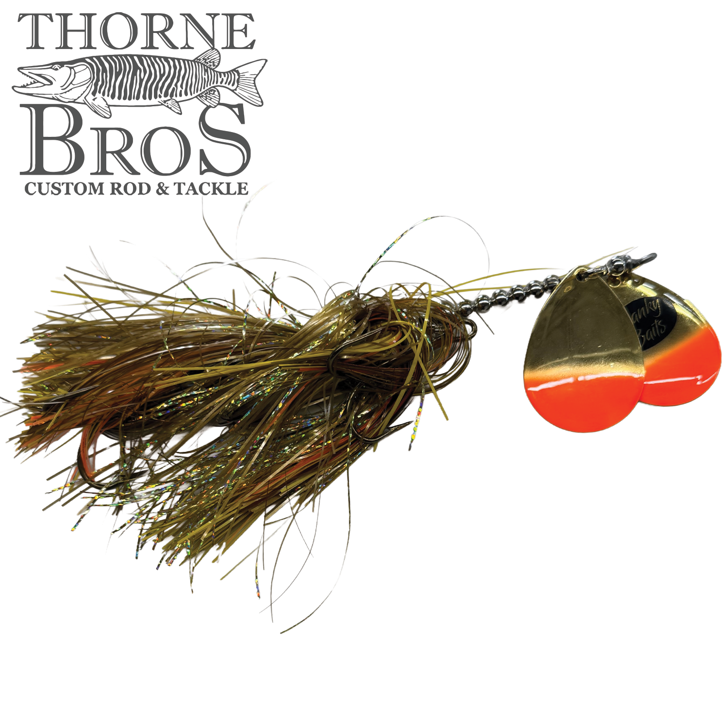 Spanky Baits Fireball 8" fishing lure featuring a gold and orange spinner blade with a multi-colored, shimmering skirt designed for musky fishing.