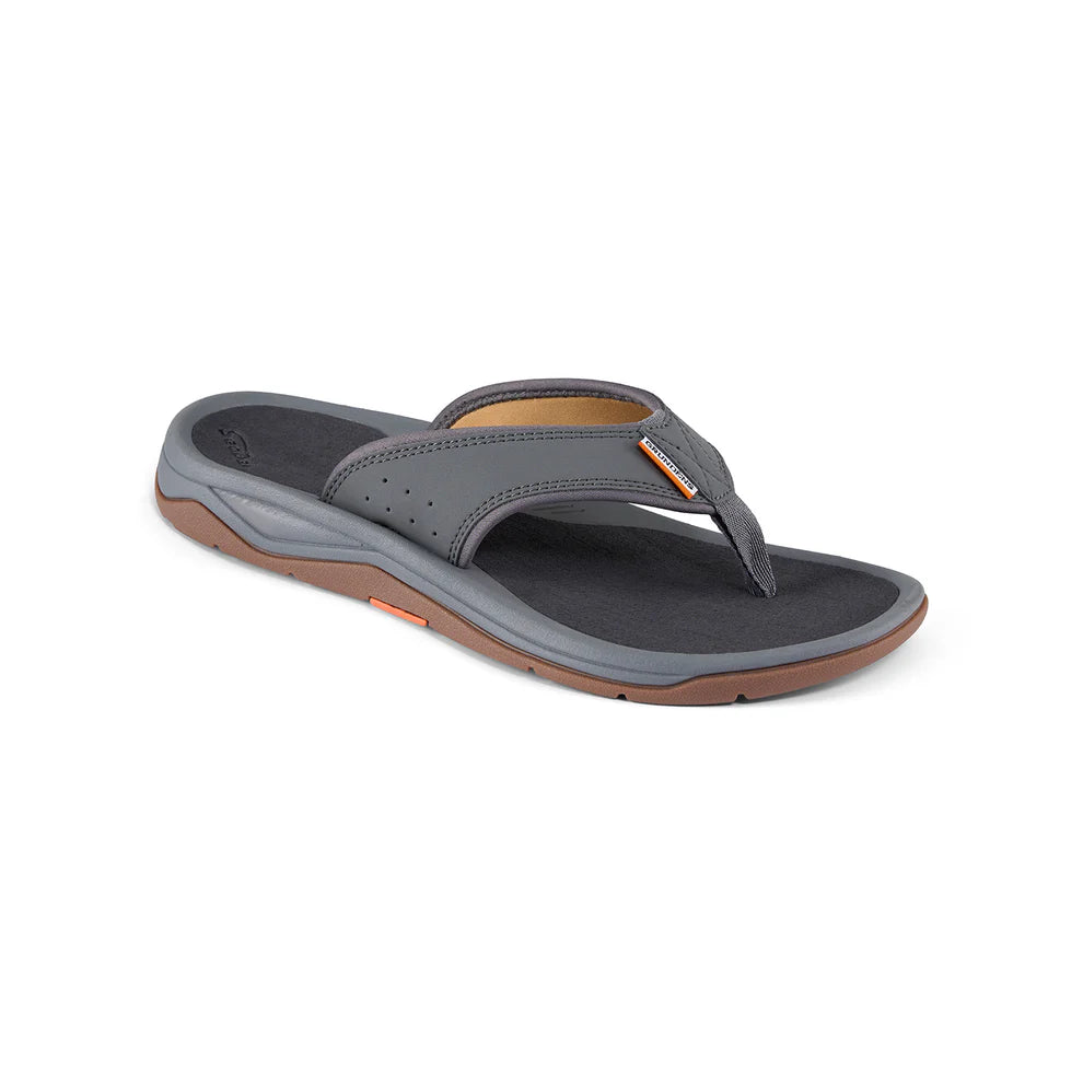 Grundens Deck Boss Sandals in gray and brown, featuring a cushioned footbed and durable strap designed for comfort and support during outdoor fishing activities.