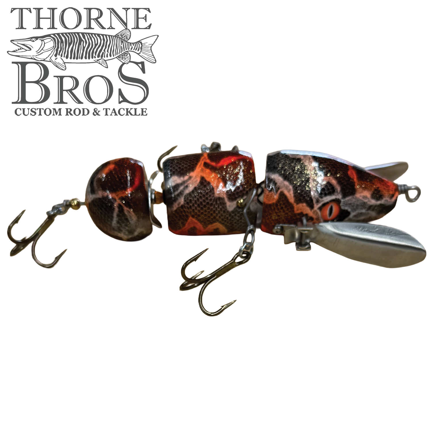 Musky Safari Franken Spitz Jr. black and orange jointed musky fishing lure with treble hooks and metal propeller blades