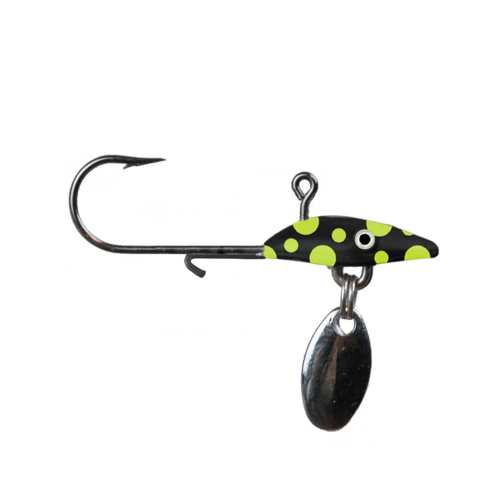 Northland Tungsten Bling Jig fishing lure with a black body featuring bright green spots, a sharp hook, and a small silver spinner for added attraction.