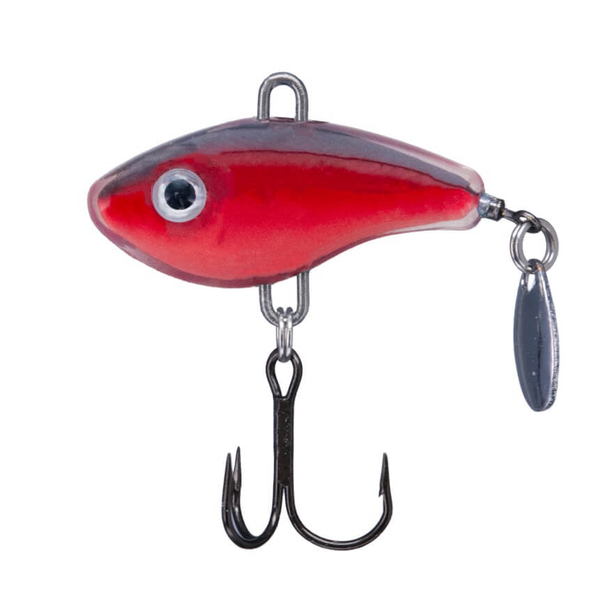 Close-up of a red and black Northland Forage Fleck fishing lure with a treble hook and a small silver spinner blade attached, designed for attracting fish in freshwater fishing.