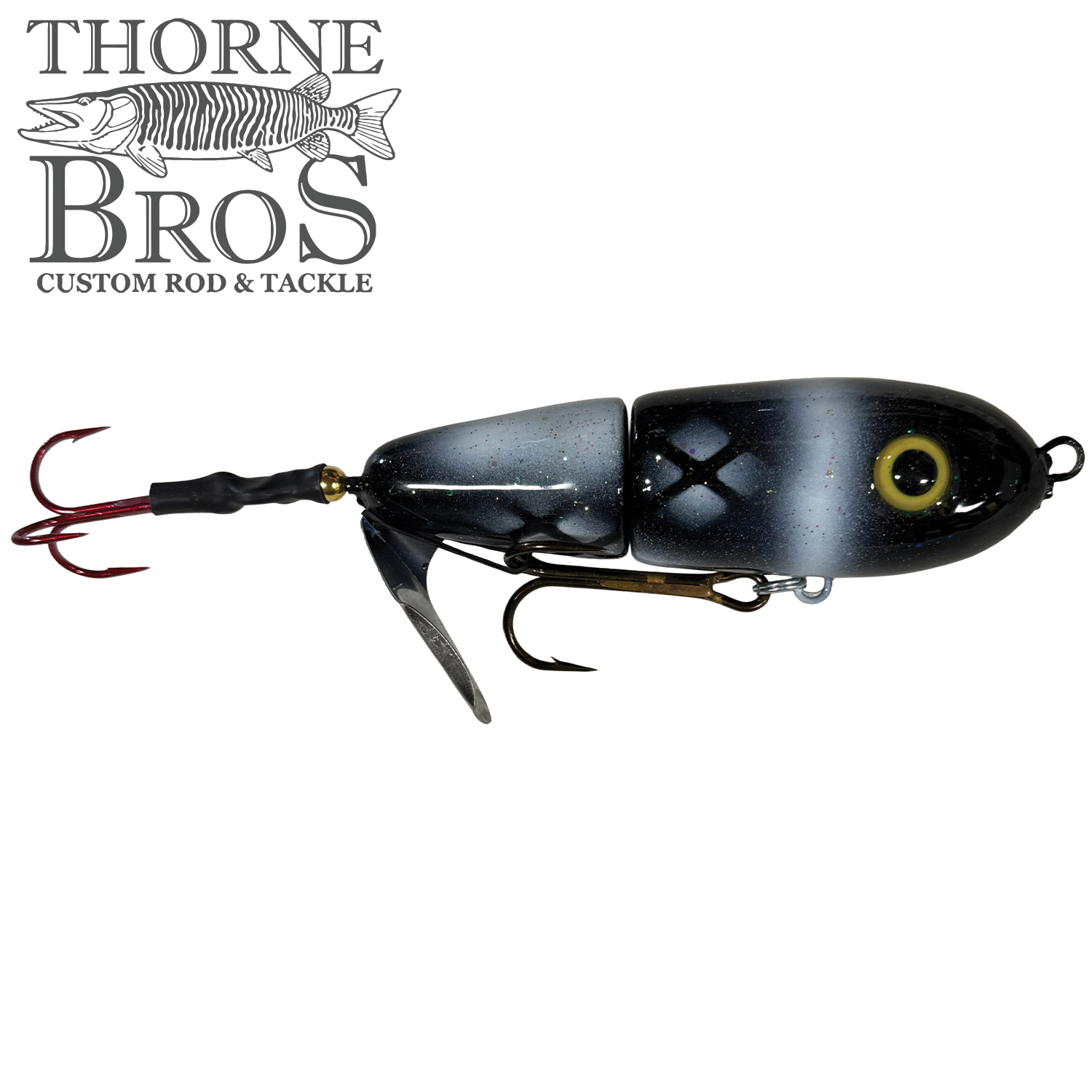 Lake-X Dr. Evil (Epoxy Finish) fishing lure with segmented gray and black body, yellow eye detail, and dual treble hooks designed for musky fishing.