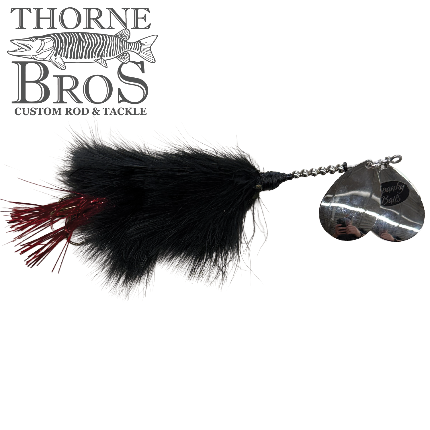 Black and red feathered fishing lure with two shiny silver spinner blades engraved with Spanky Baits logo, designed for musky fishing, named Spanky Baits Raven.