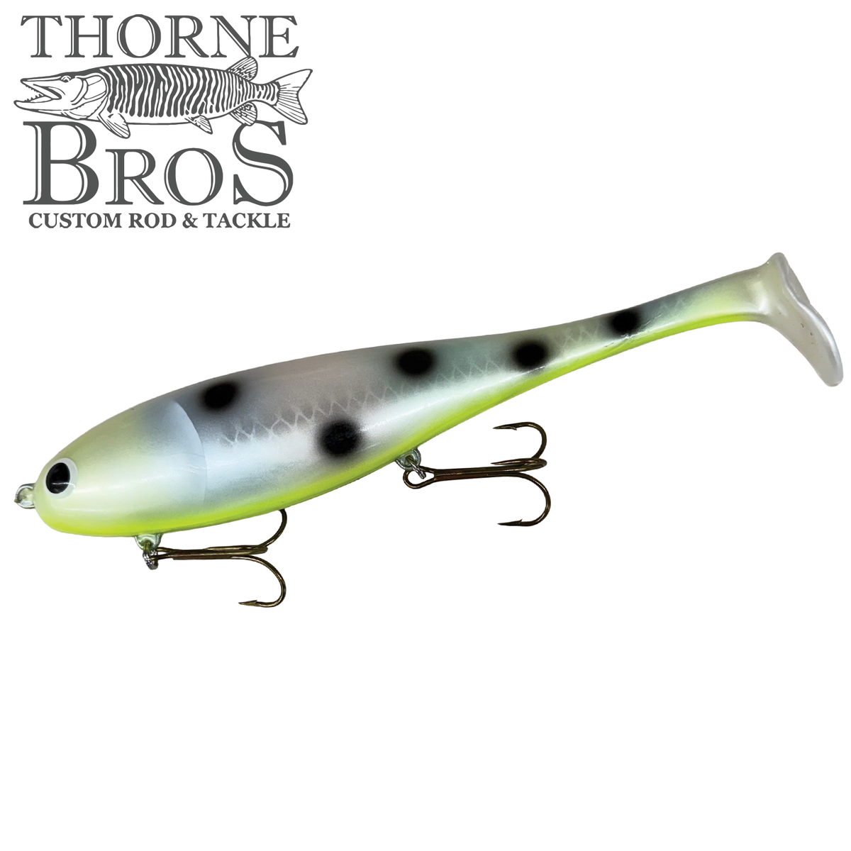 Musky Innovations Magnum Swimmin' Dawg - SHALLOW fishing lure with a pale green body black spots curved tail and treble hooks