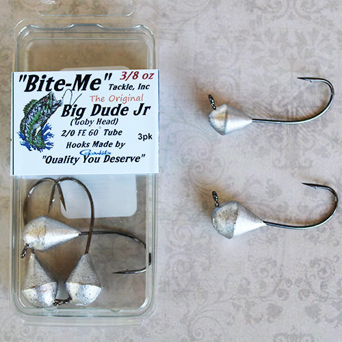 Bite-Me Tackle "Big Dude" Junior Tube Jig showing silver weighted jig heads with sharp hooks, designed for fishing tackle use in targeting musky and other species.