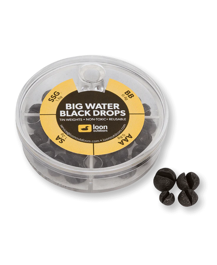 Loon Tin Drop Assortments featuring a round, transparent container with black tin weights inside, labeled for fishing tackle use, non-toxic and reusable.