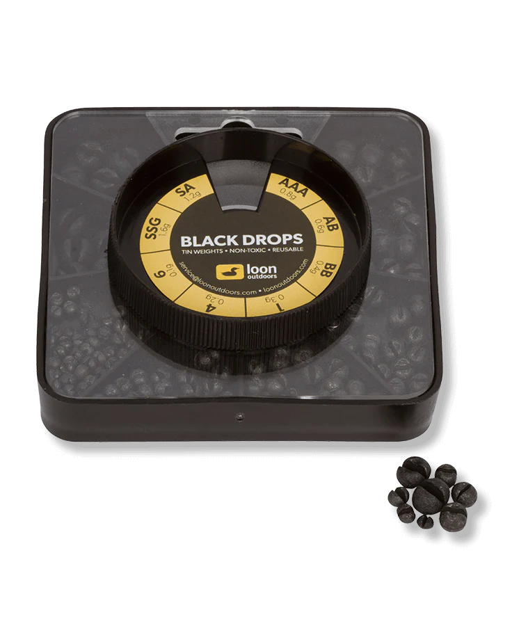 Loon Tin Drop Assortments featuring a black, segmented container filled with various sizes of reusable, non-toxic tin fishing weights for precise tackle customization.