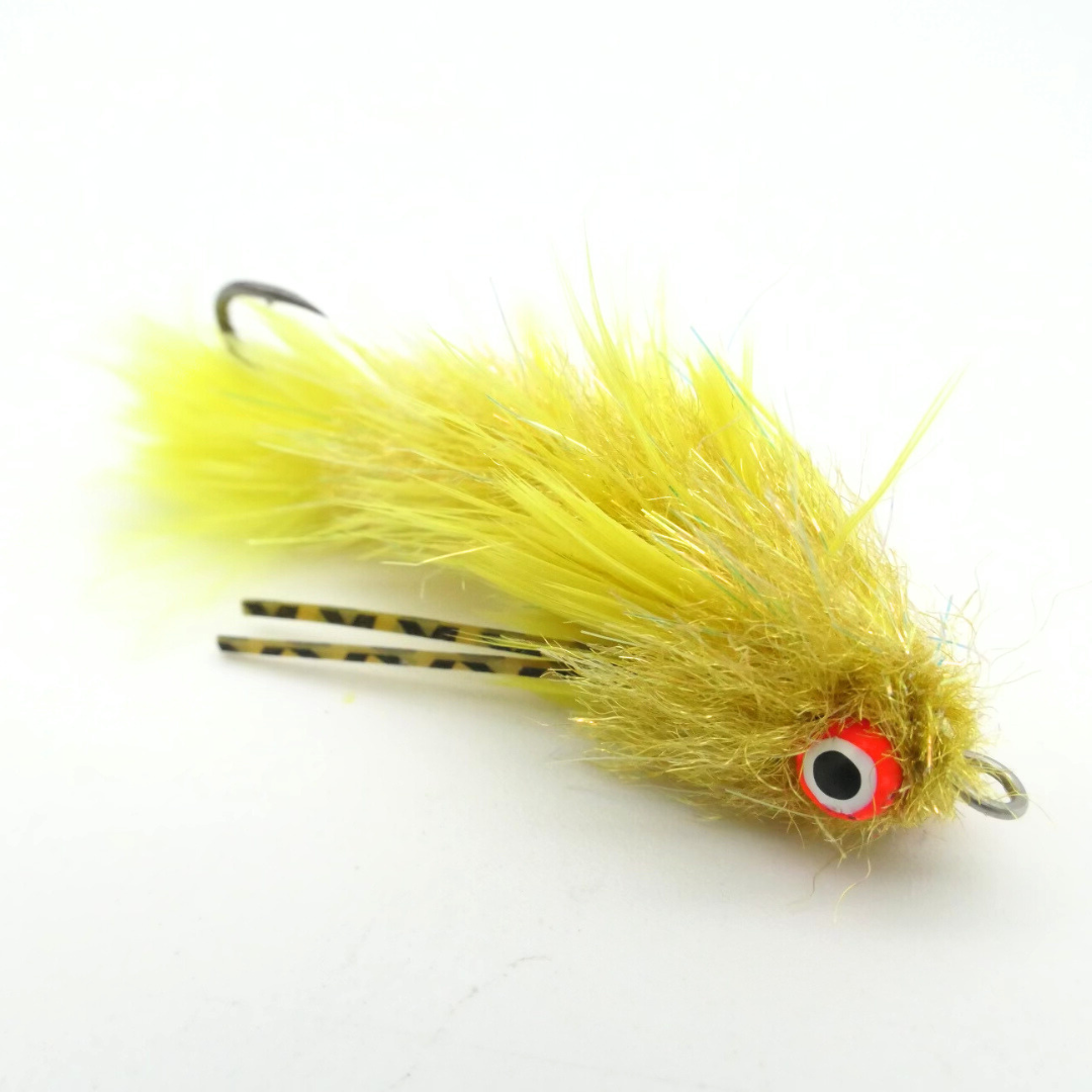 Flymen Next Woolly Bugger Changer fishing lure in yellow with lifelike eyes and detailed feathers, designed for fly fishing and fishing tackle enthusiasts.