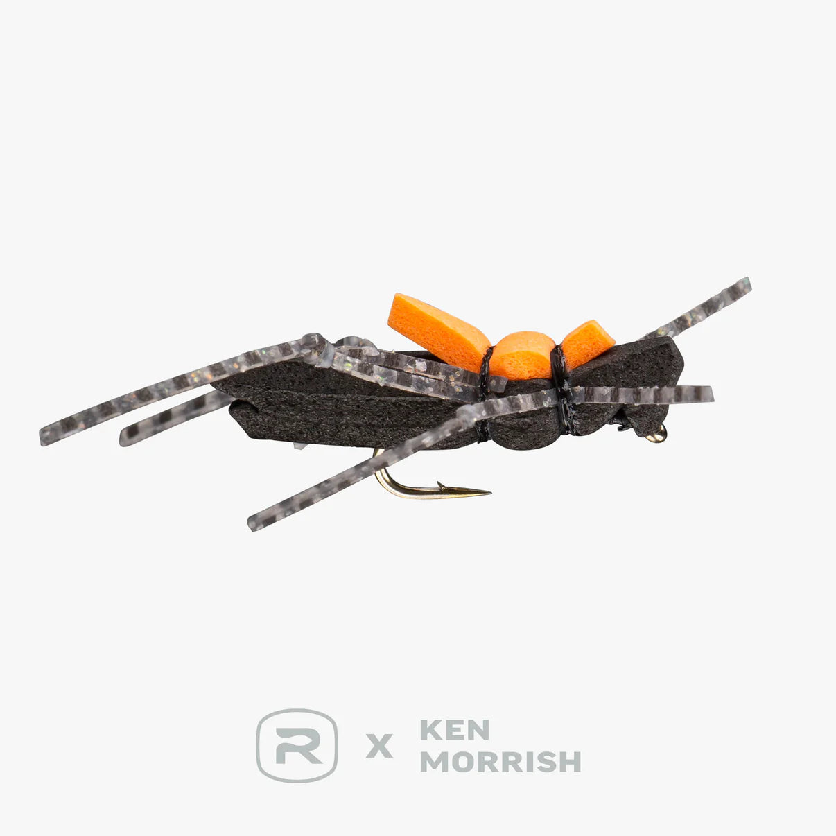 Morrish Hopper fishing lure with black foam body, bright orange accents, and patterned segmented legs designed for freshwater fly fishing and musky tackle.