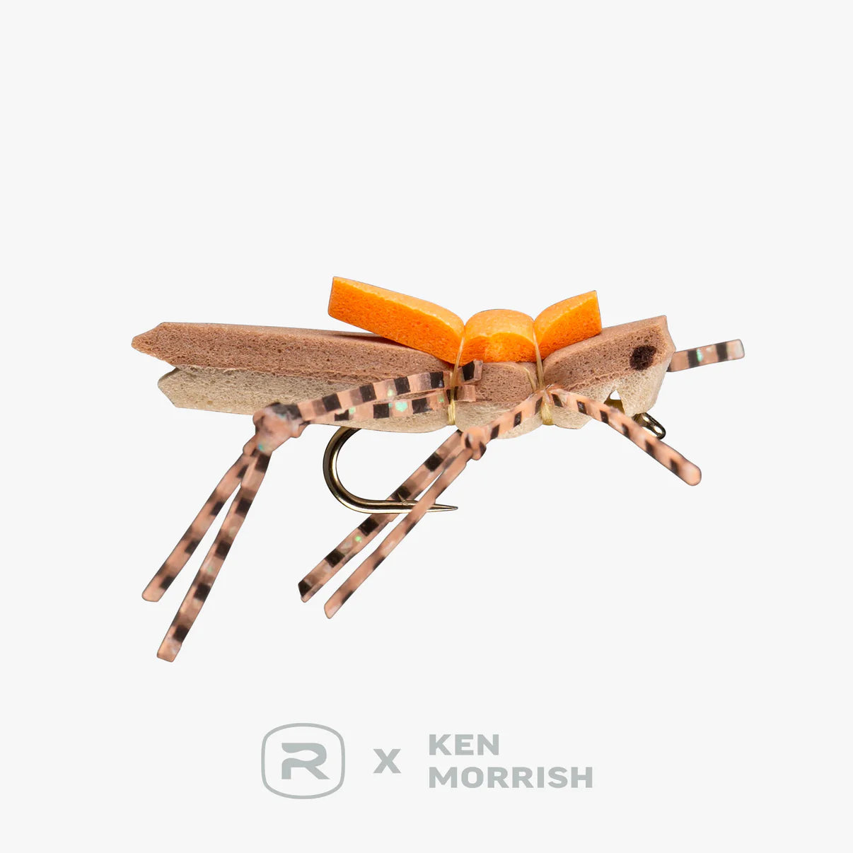 Detailed close-up of a tan and orange Morrish Hopper fishing lure with patterned legs designed to mimic a grasshopper for freshwater fly fishing.