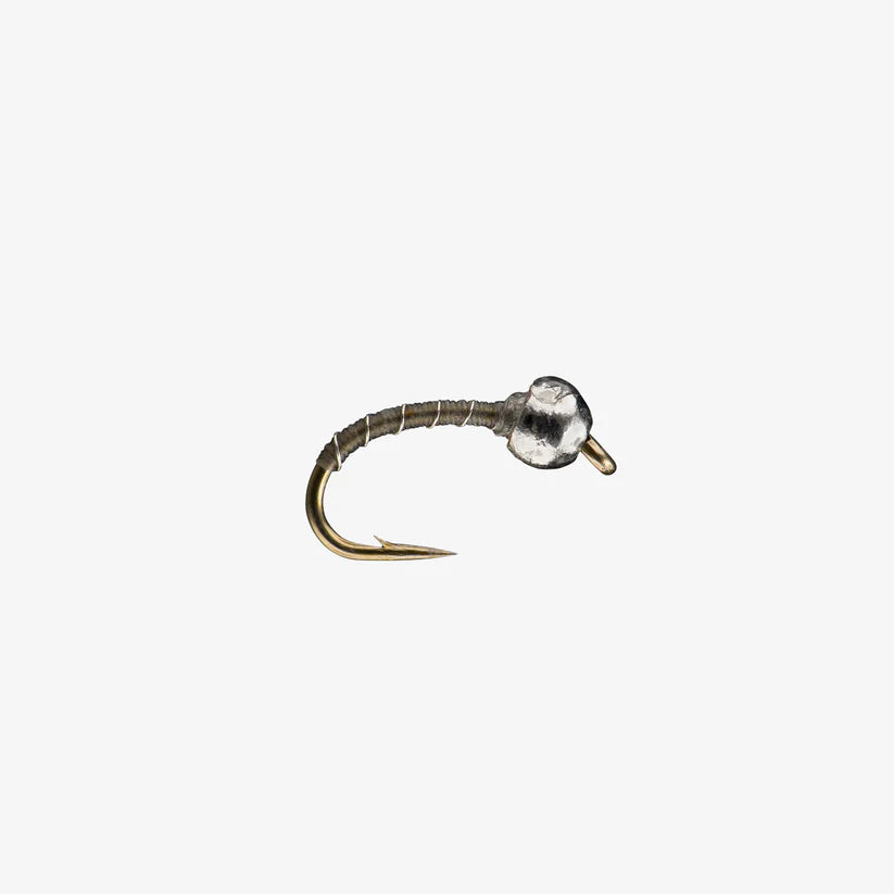 Close-up of a Zebra Midge Tungsten fishing fly featuring a thin, segmented dark gray body with a shiny tungsten bead head and a sharp bronze hook, designed for freshwater fishing tackle.