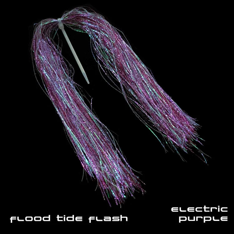 Sight Cast Flood Tide Flash is an electric purple fishing lure skirt with fine, iridescent strands designed to enhance movement and attract fish in freshwater fishing tackle.