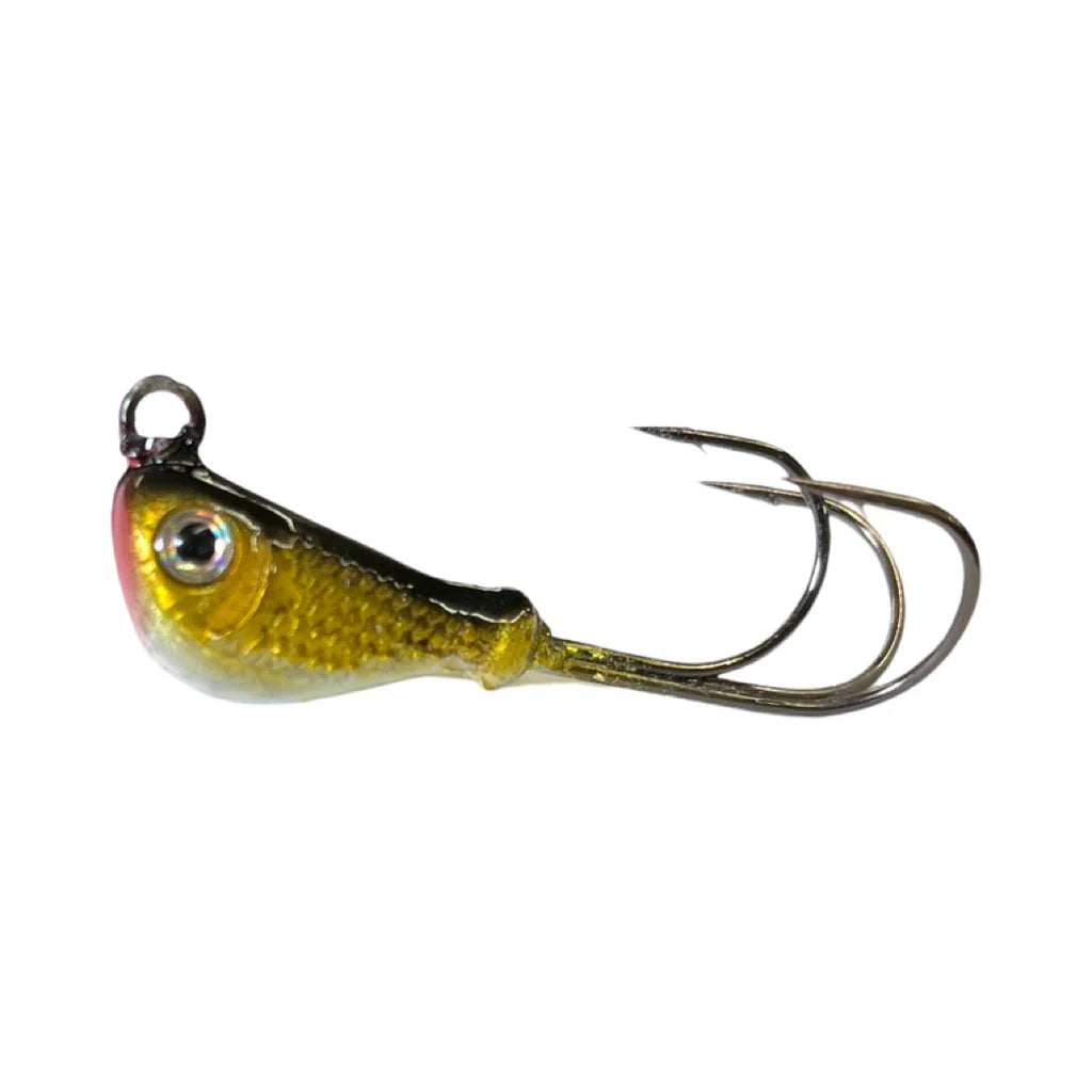 Mission Tackle Grabber Jig fishing lure with a detailed yellow and gold fish-shaped head and sharp twin hooks, designed for effective fishing tackle use.