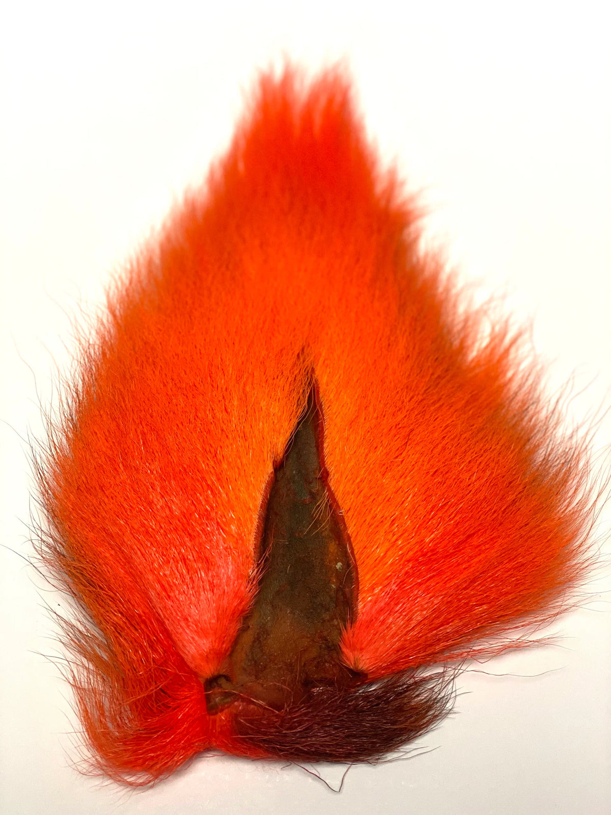 Marabou Brothers El Presidente Grade Buck Tail with vivid orange and red marabou fibers and a dark central hair accent for musky fishing tackle
