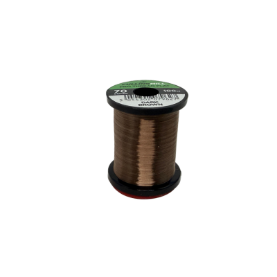 Spool of Fulling Mill Pro Thread Flat 70 Den in brown, used for fly fishing tackle and lure customization at a Premier Midwest fishing gear shop.