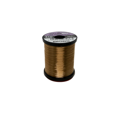 Fulling Mill Pro Thread Flat 210 Den spool of brown thread used for detailed fly fishing lure tying and fishing tackle customization.
