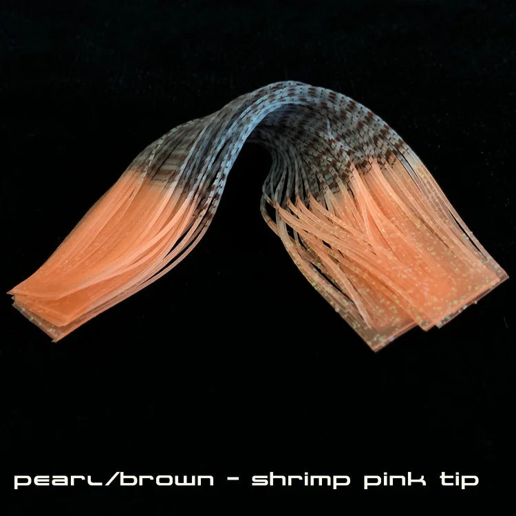 Sight Cast Marsh Legs fishing lure skirt in pearl brown with shrimp pink tips, designed with multiple silicone legs for lifelike movement in water.