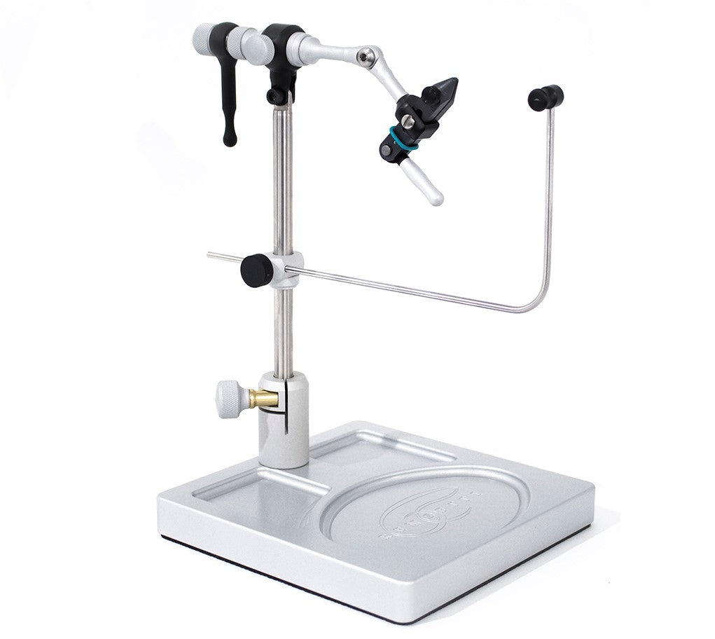 Renzetti Presentation 2000 Vise showing a sturdy silver metal base with an adjustable vertical post, clamp mechanism, and rotating arm designed for secure fly tying and fishing tackle assembly.