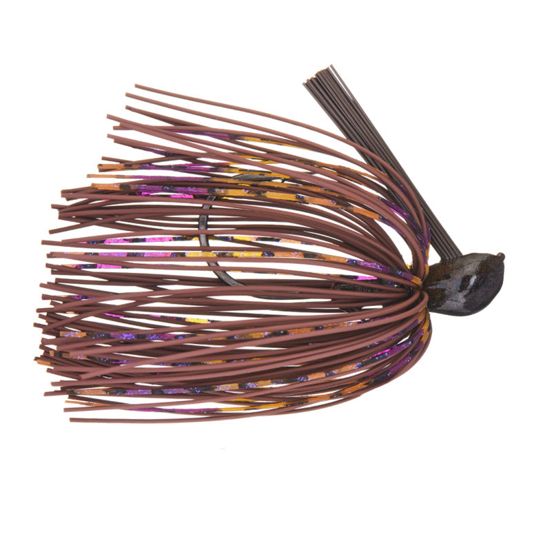 Greenfish Tackle Sinewy Jig fishing lure featuring flexible brown and purple skirt strands with a weighted head and weed guard, designed for effective musky fishing tackle.