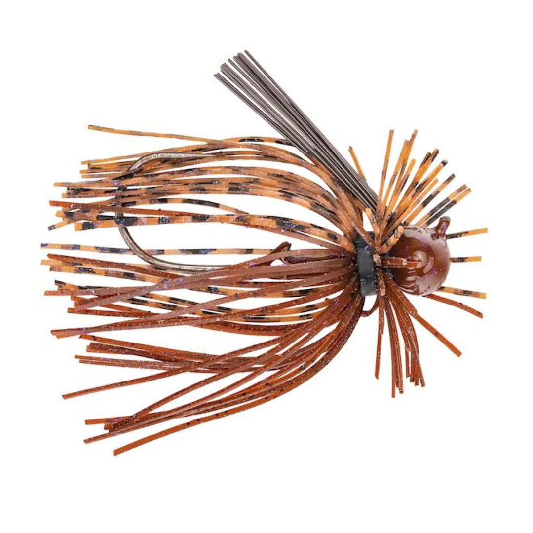 Close-up of a brown and black Strike King Tour Grade Finesse Football Jig fishing lure with flexible silicone skirt strands and a weighted head designed for finesse fishing techniques.