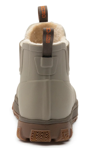 Grundens Women's Deviation Sherpa Ankle Boot shown from the back with tan waterproof construction warm sherpa lining pull tab and rugged lug sole