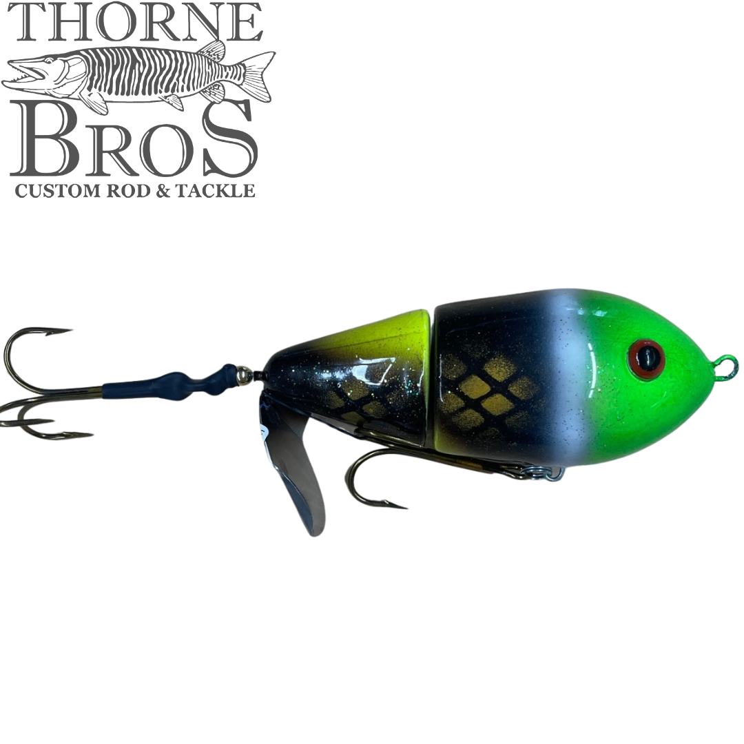 Lake-X Cannonball JR. (Epoxy Finish) fishing lure with vibrant green and black segmented body, detailed scale pattern, and multiple sharp hooks for effective musky fishing.