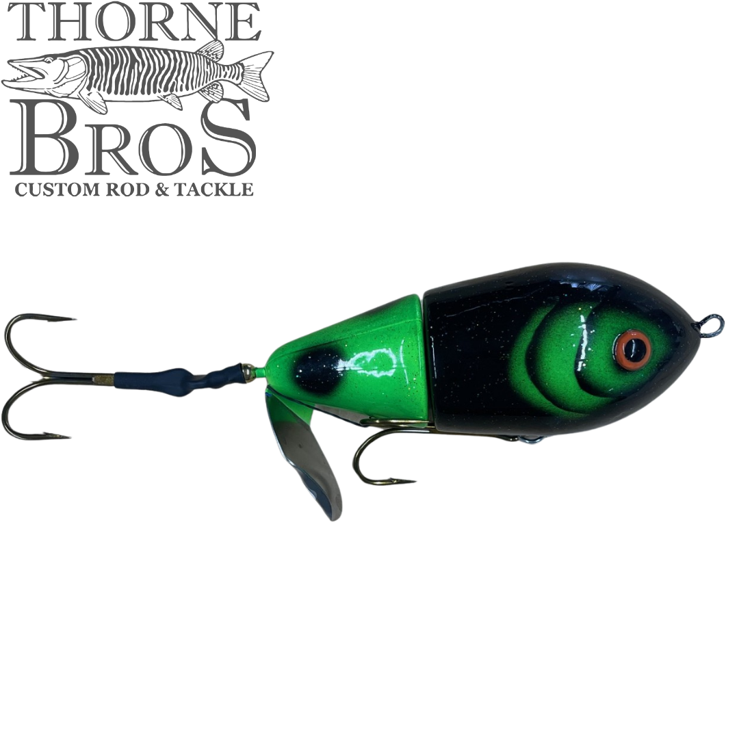 Lake-X Cannonball JR. (Epoxy Finish) fishing lure with green and black segmented body, detailed eye, metal blade, and dual treble hooks for musky fishing tackle.