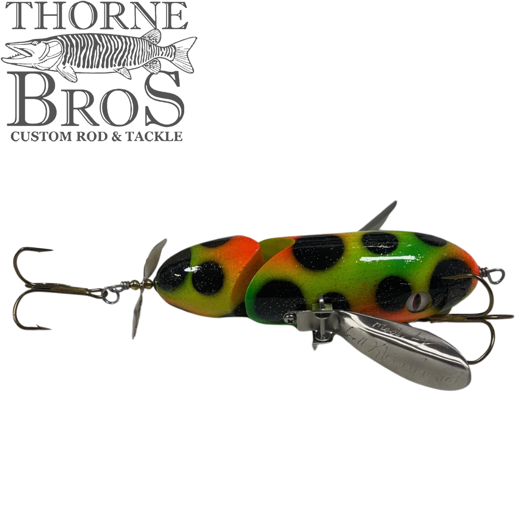 Simulated alt text for Musky Safari Jointed Spitzer for thorne-bros-custom-rod-tackle.myshopify.com. You are an expert SEO agent. You will generate an ALT text for this image. <Store_Context> Business Details: - Premier Midwest shop specializing in musky tackle...