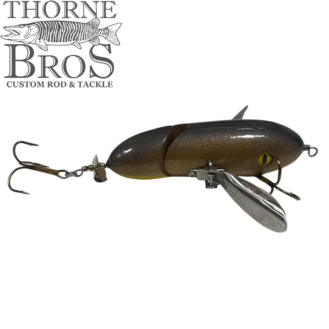 Simulated alt text for Musky Safari Jointed Spitzer for thorne-bros-custom-rod-tackle.myshopify.com. You are an expert SEO agent. You will generate an ALT text for this image. <Store_Context> Business Details: - Premier Midwest shop specializing in musky tackle...