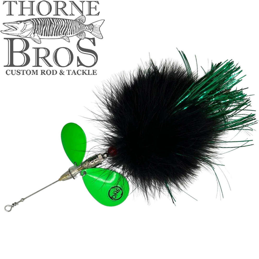 Angling Revolution "The Little One" black and green musky fishing lure with large spinner blades and marabou tail shown on a white background