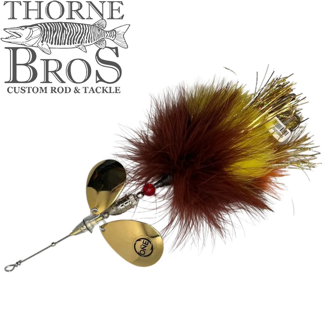 Angling Revolution "The Little One" musky fishing lure with brown and yellow bucktail skirt and gold spinner blades on a white background