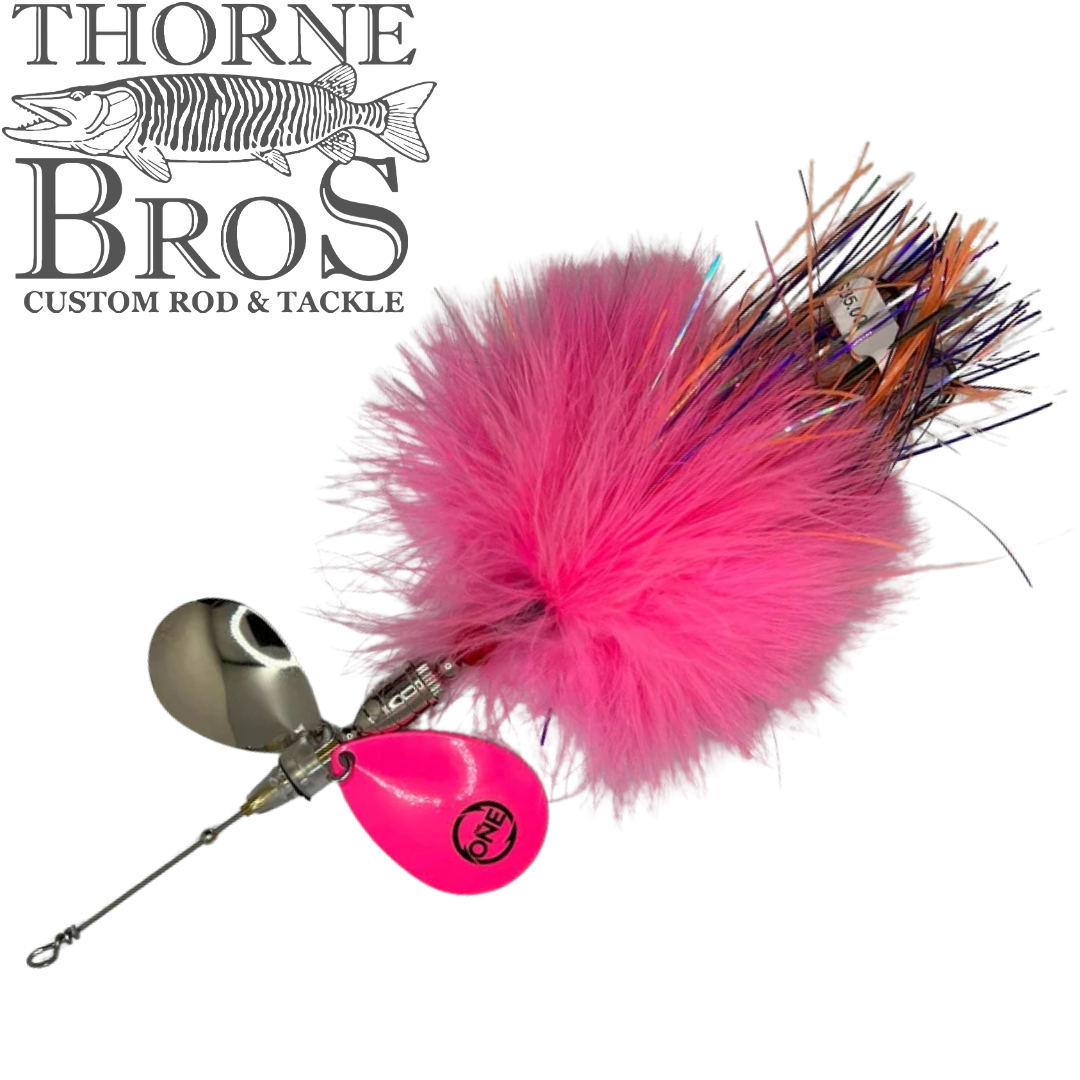Angling Revolution "The Little One" bright pink musky fishing lure with bucktail skirt double spinner blades and flashy tinsel accents from Thorne Bros custom rod and tackle