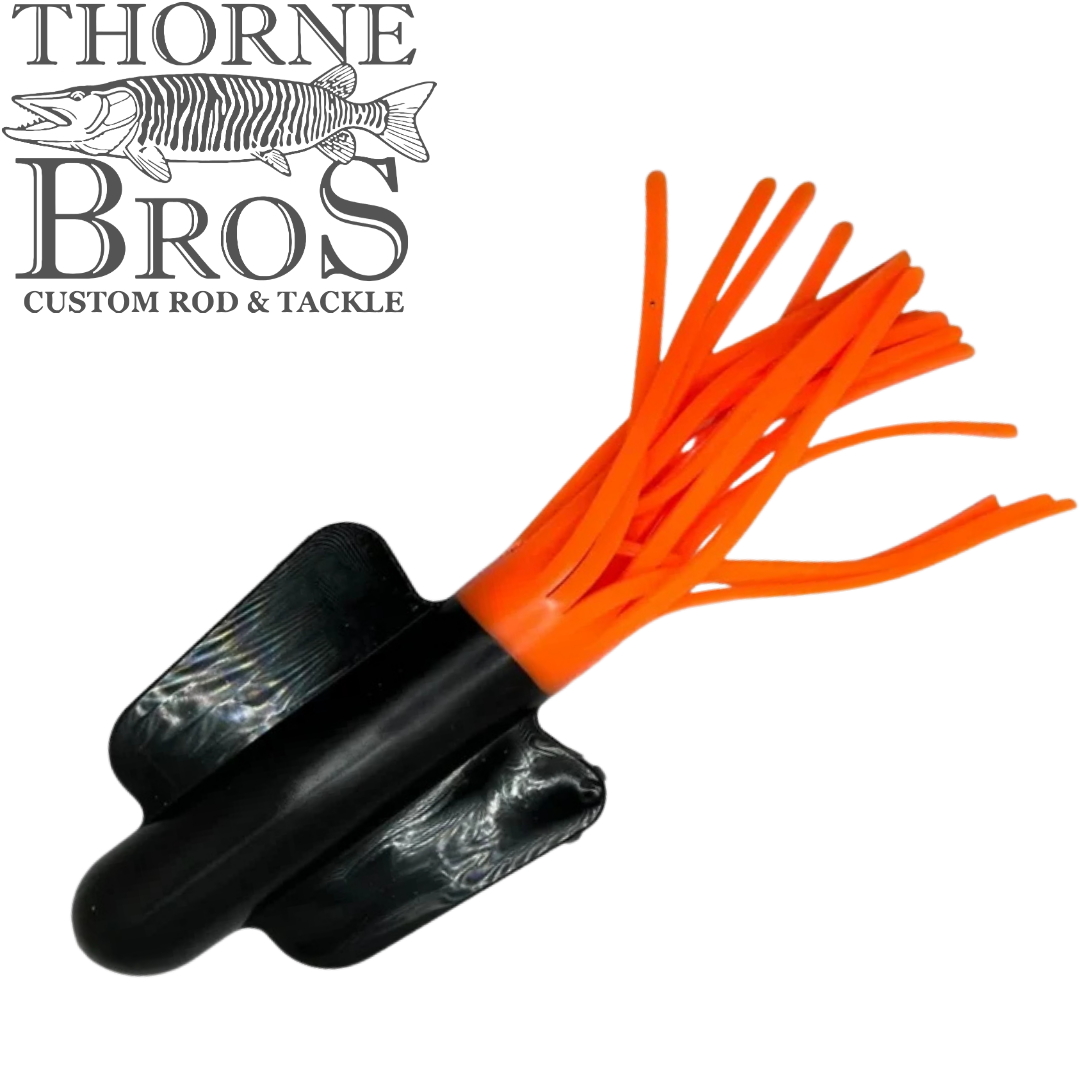 Angling Revolution Squiddy Tube black and orange fishing lure with tentacle strands for musky fishing tackle