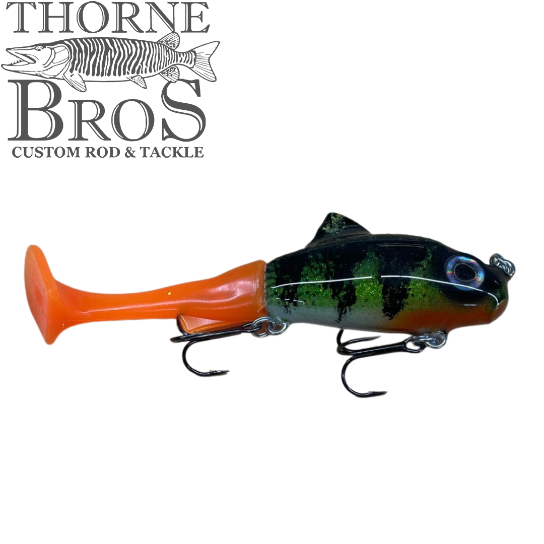 Zilla Baits TicTak musky fishing lure with a black and green fish body orange tail and treble hooks