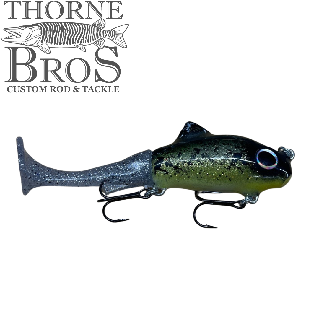 Thorne Bros Zilla Baits TicTak musky fishing lure with a realistic green and black fish design and treble hooks for freshwater fishing