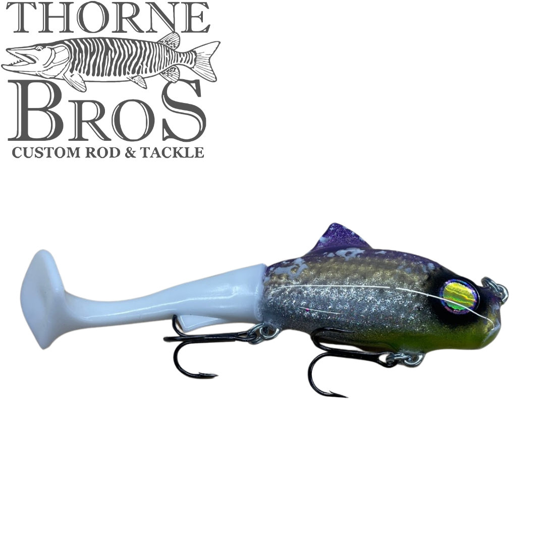 Zilla Baits TicTak musky fishing lure with blue gray fish body paddle tail realistic eye and treble hooks from Thorne Bros custom rod and tackle