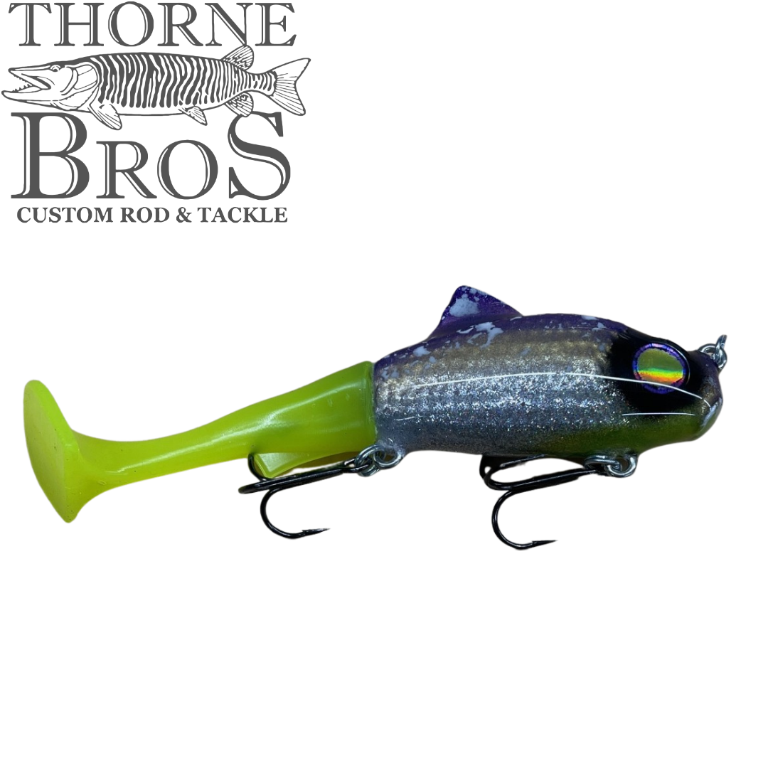 Zilla Baits TicTak musky fishing lure with a dark blue and black body bright chartreuse tail and hooks for fishing tackle