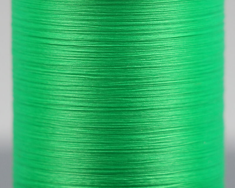 Close-up image of vibrant green synthetic thread spool used for fishing tackle, labeled UNI 8/0 Thread, showing smooth tightly wound fibers ideal for musky and fly fishing rod customization.